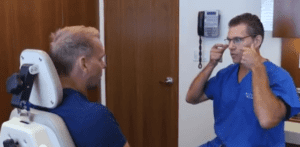 Dr. Diamond talking to a patient during a consultation