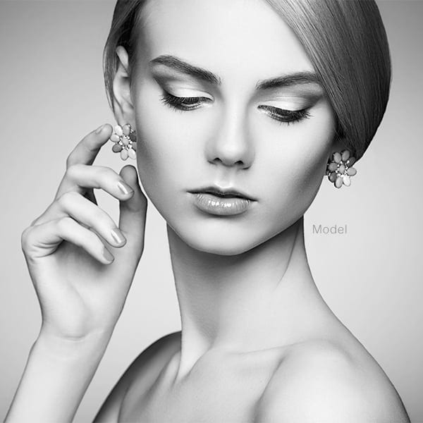 Woman touching earring