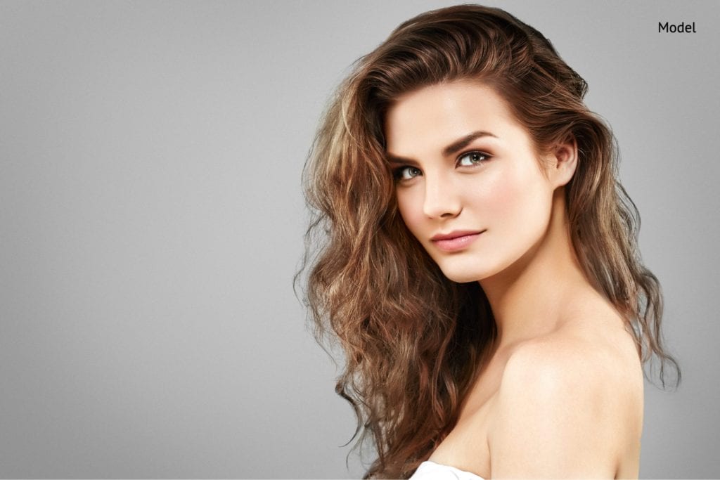 amazing woman portrait. beautiful girl with long wavy hair-img-blog