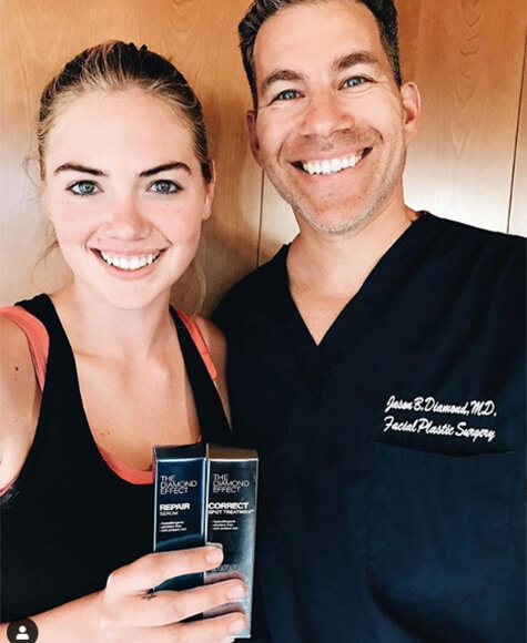 Kate Upton with Dr. Diamond, holding The Diamond Affect: repair serum, correct spot treatment