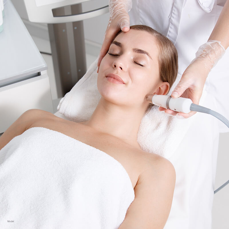 Woman getting a laser treatment done
