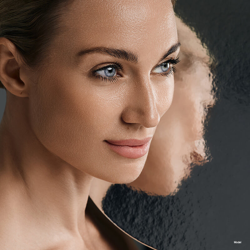 beautiful woman by her reflection