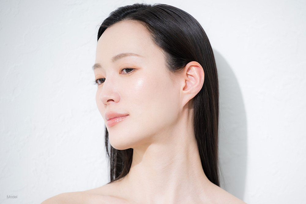 Mature woman with long black hair