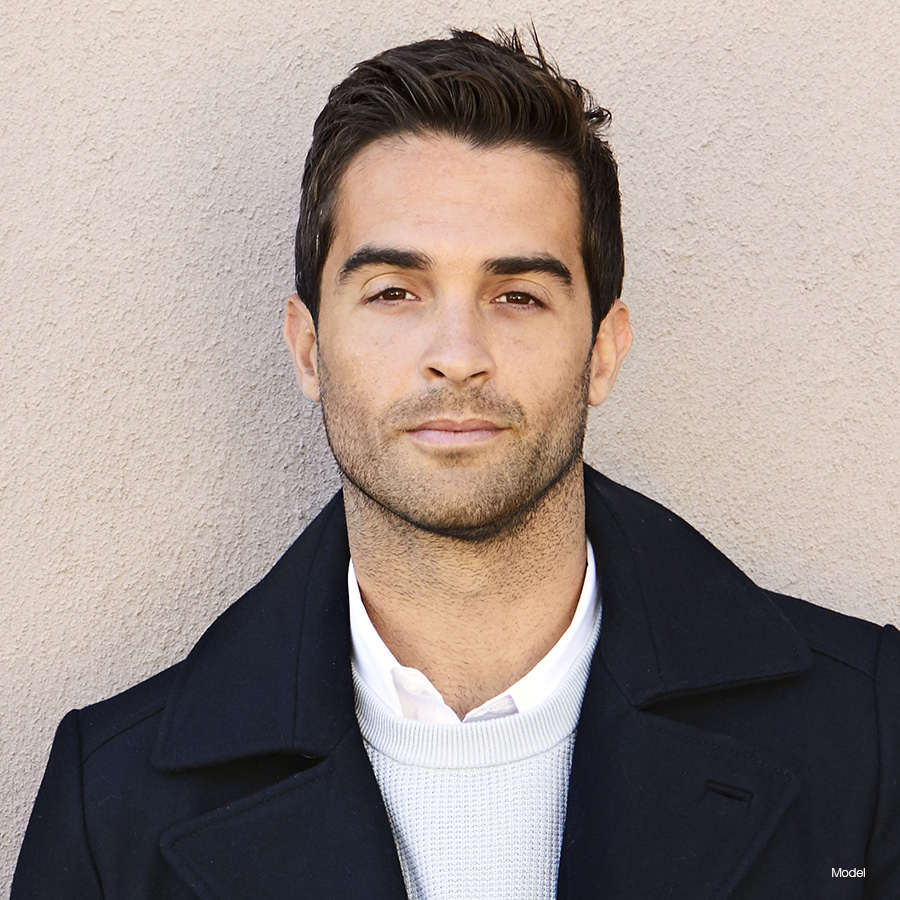 Mature man in a black coat
