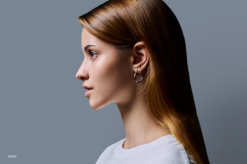 Profile of a young woman with straight hair